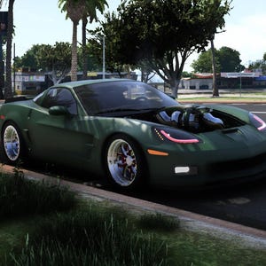 May include: A dark green sports car with its hood open, revealing engine components. The car has custom wheels and is parked on the side of a road with palm trees in the background. The car's headlights have a pink glow.
