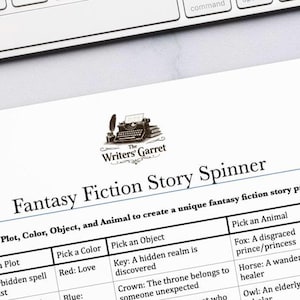 May include: A white paper sheet titled Fantasy Fiction Story Spinner from The Writers' Garret. The document features a table with columns for Pick a Plot, Pick a Color, Pick an Object, and Pick an Animal to generate fantasy story prompts.