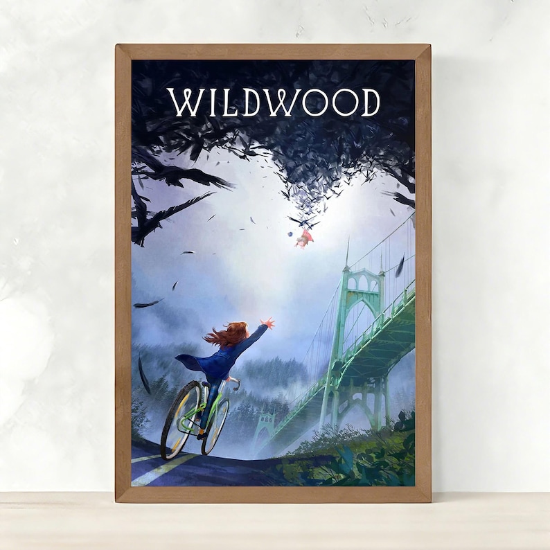 May include: A framed art print featuring the word "WILDWOOD" at the top. The artwork depicts a person on a bicycle reaching towards a bridge. The bridge is green, and the sky is filled with dark birds. The artwork is in a wooden frame.