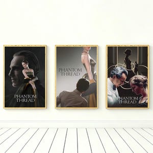 May include: Three rectangular wall art prints featuring movie posters for Phantom Thread. Each poster displays different scenes with characters in formal attire, including a man and a woman, with the text Phantom Thread printed on each.