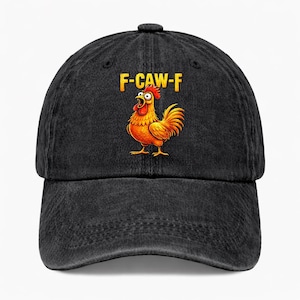May include: Black denim baseball cap featuring a cartoon chicken with the text "F-CAW-F" in yellow. The chicken is orange and red with an open beak. The cap has a curved brim and a button on top.