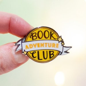 Adventure Book Club Enamel Pin