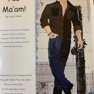 May include: A colorful, quilted illustration of a cowboy standing next to a fence post. The cowboy is wearing a brown shirt, blue jeans, and a brown hat. The background is a collage of different fabrics and textures. The text "Yes Ma'am!" is written at the top of the image, and the text "By Laura Heine" is written below it.