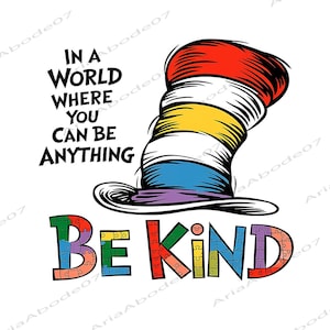 以下が含まれることがあります： ストライプの帽子と「IN A WORLD WHERE YOU CAN BE ANYTHING BE KIND」という言葉が書かれたカラフルなグラフィック。 「BE KIND」という文字は、さまざまな色のパズルのピースで構成されています。 帽子は赤、白、黄、青、紫のストライプです。