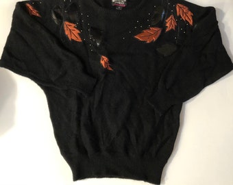 Vintage black sweater with brown and black leaf pattern/Bubbles International