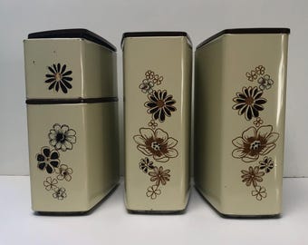Vintage retro stacking floral tin canister set