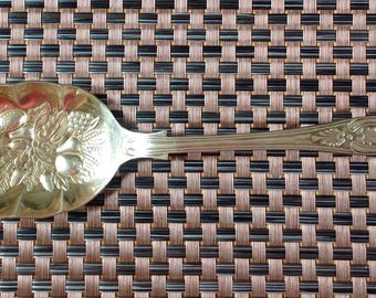 Vintage raised motif serving spoon EPNS A1 Sheffield England