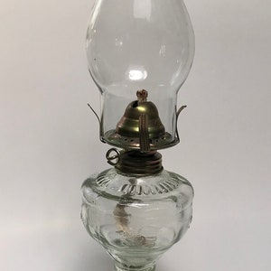 Vintage clear glass oil lamp