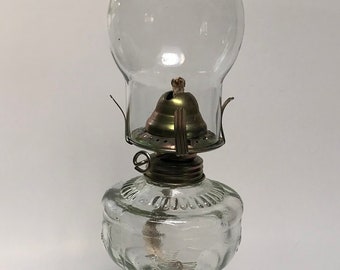 Vintage clear glass oil lamp