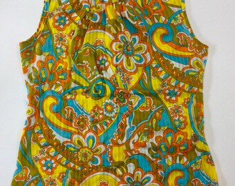 Vintage sleeveless blouse with retro flower pattern