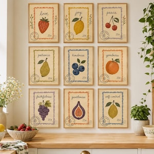 May include: A set of nine rectangular wall art prints arranged in a grid, each featuring a different fruit illustration, a postage stamp border, the text 25 cents, and a virtue word: love, joy, peace, patience, kindness, goodness, faithfulness, gentleness, self-control.