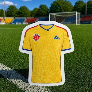 May include: A yellow short-sleeved jersey with a V-neck collar featuring blue and red accents. The shirt displays a subtle tonal graphic pattern, a circular emblem on the right chest, and a blue three-stripe logo on the left chest area.