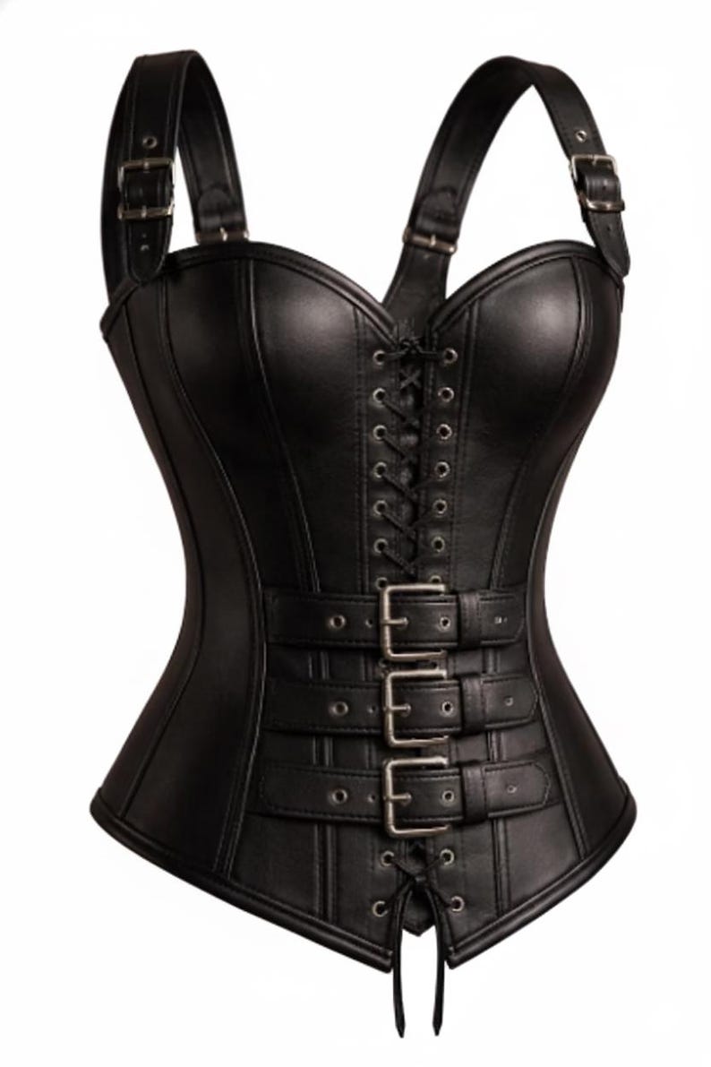 May include: Black corset with adjustable shoulder straps and multiple buckle closures. The bodice features a lace-up front and is made of a smooth, dark material. The corset has a structured silhouette.