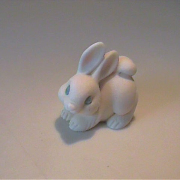Vintage 1970's porcelain tan bunny rabbit with blue eyes