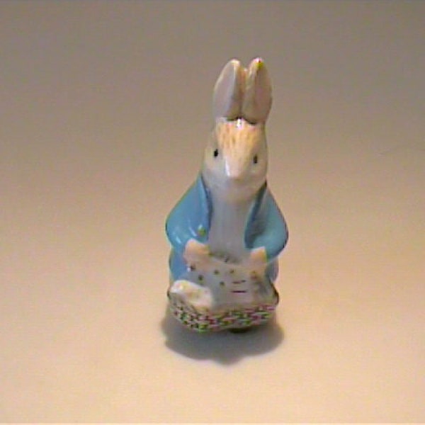 Vintage miniature bone china rabbit with a basket