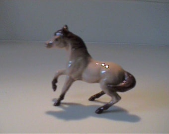 Vintage miniature Hagen Renaker Buckskin mare prancing horse
