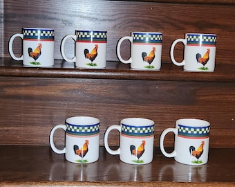 Set of Seven Ella's Rooster Mugs by Bob Timberlake, International Tableworks, Vintage Mint, 3.25" diameter, 3.75" tall, colorful