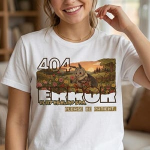 May include: A set of three ceramic mugs with a speckled, cream-colored glaze. Each mug features a different hand-painted design: a blue and green leaf, a yellow flower, and a red berry. The mugs have a simple, rounded shape.