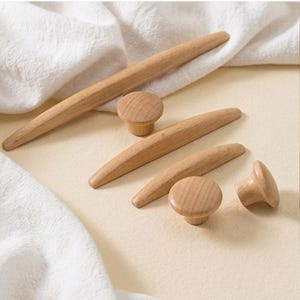 May include: A white ceramic mug with a black handle and the text "But First, Coffee" in a black, bold font. The mug is likely 11 ounces in size, perfect for a morning beverage.