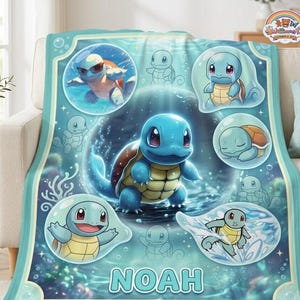 May include: A light blue fleece blanket featuring multiple illustrations of the blue turtle-like character Squirtle in various poses and expressions, set against an underwater background with bubbles and the name NOAH printed in large letters.