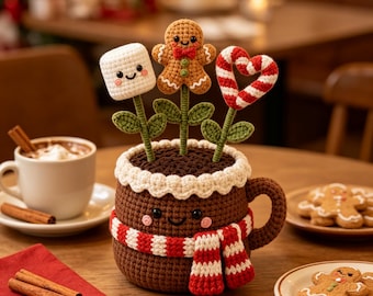 Gehäkeltes Weihnachtsarrangement aus Tassen für heiße Schokolade, Lebkuchenmann-Zuckerstangen-Blumentopf, winterliche Etageren-Dekoration