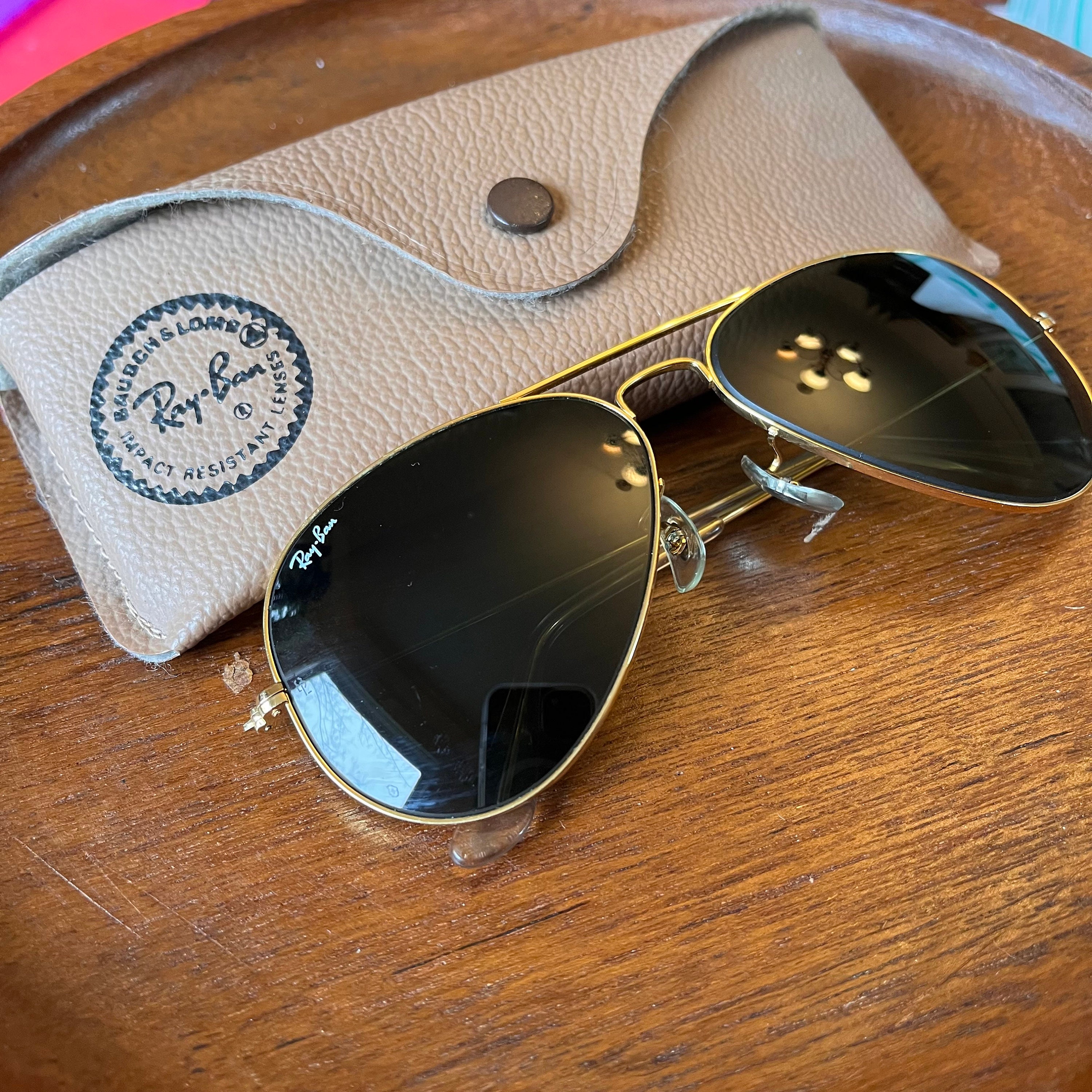 Ray ban sunglasses gold frame sales black lens