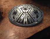 Native American silver belt buckle with tipi