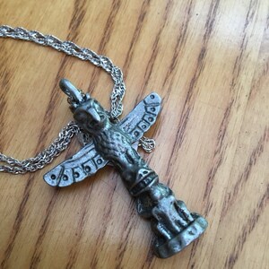 Vintage pewter totem pole