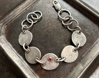 Pulsera de guijarros de zafiro naranja