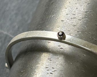 Brazalete de zafiro estrella negro