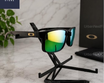 Oakley Holgrove-Sonnenbrille - Mattschwarzer Rahmen, polarisierte Gläser & goldene Ikone