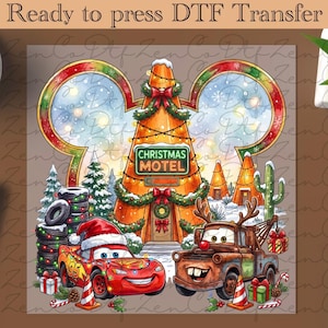 May include: A Ready to press DTF Transfer featuring a Christmas-themed motel shaped like a cone, a red race car with a Santa hat, and a brown tow truck with reindeer antlers. The scene includes stacks of tires, a cactus, and gift boxes.