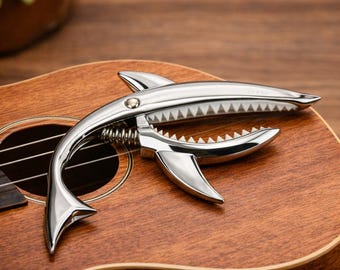 Metal Shark gitarr ukulele capo, lekfullt instrumenttillbehör, musikergåva