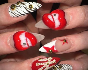 Uñas postizas de aguja con estampado de cebra roja y negra, set de arte con tachuelas doradas 3D