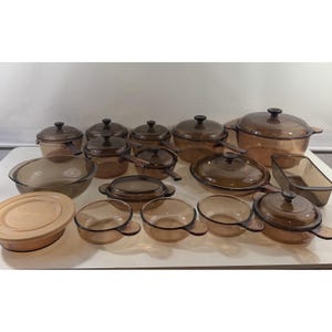 Juego de 27 piezas de tapas, ollas, sartenes y cuencos de vidrio ámbar Corning Pyrex Visions vintage
