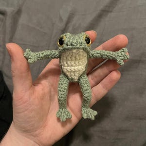 Crochet frog pattern - A crocheted frog in a hand