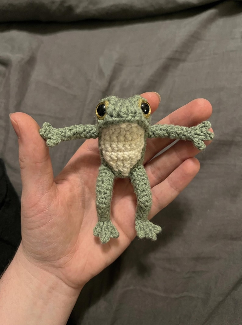 Crochet frog pattern - A crocheted frog in a hand