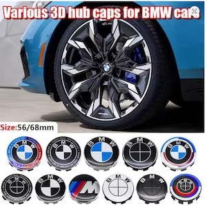 Könnte beinhalten: Verschiedene 3D-Radkappen für BMW-Autos. Das Bild zeigt ein Autorad mit einer schwarz-silbernen Radkappe. Unten sind mehrere Radkappen mit dem BMW-Logo in verschiedenen Designs und Farben. Die Größe beträgt 56/68 mm.
