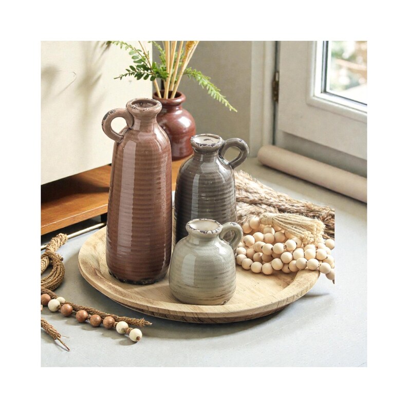 ceramic vase set of 3 farmhouse decor neutral tones, rustic boho pampas vases for home styling, decorative vases with handle for shelf decor, modern farmhouse vase set for table centerpiece, terracotta vases for dried flowers and pampas grass, neutral ceramic vases for entryway table decor, flower vases set for living room shelf styling, boho chic ceramic vase set minimalist decor, rustic clay vases for home decoration ideas, decorative pampas vases for mantel styling, aesthetic neutral vases