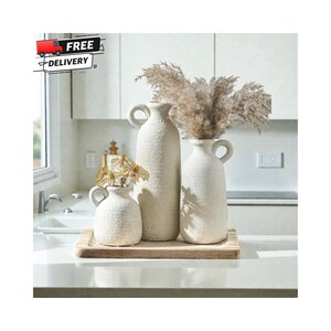 ceramic vase set of 3 farmhouse decor neutral tones, rustic boho pampas vases for home styling, decorative vases with handle for shelf decor, modern farmhouse vase set for table centerpiece, terracotta vases for dried flowers and pampas grass, neutral ceramic vases for entryway table decor, flower vases set for living room shelf styling, boho chic ceramic vase set minimalist decor, rustic clay vases for home decoration ideas, decorative pampas vases for mantel styling, aesthetic neutral vases