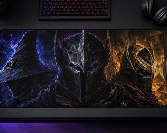 May include: A rectangular desk mat featuring a fantasy illustration of three armored figures. The left side displays a dark blue wizard in a pointed hat, the center shows a knight in a dark helmet, and the right side depicts a warrior in golden armor.