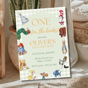 May include: A rectangular invitation card with a light green gingham border featuring watercolor illustrations of storybook characters. The text reads: ONE for the books! Join us for OLIVER'S FIRST BIRTHDAY, AUGUST 16, 2:00 PM, 456 Storybook Lane, Dallas, TX 75001, RSVP: Sarah (555) 123-4567.