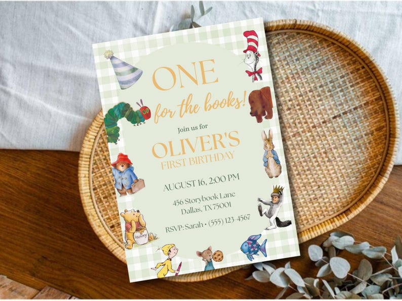 May include: A rectangular invitation card with a light green gingham border and a central pale green panel. It features illustrations of storybook characters and the text: ONE for the books! Join us for OLIVER'S FIRST BIRTHDAY, AUGUST 16, 2:00 PM.
