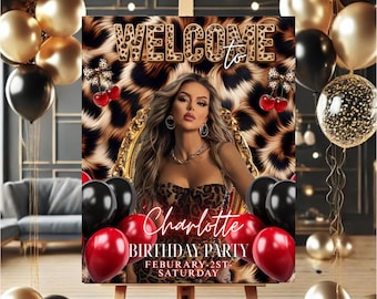 May include: A party sign on an easel with the text "WELCOME to Charlotte BIRTHDAY PARTY February 2nd Saturday". The sign features a woman in a leopard print dress, surrounded by black, red, and gold balloons.