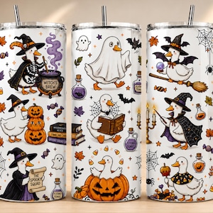 May include: A white cylindrical tumbler featuring a repeating Halloween-themed pattern of ducks dressed in costumes. Illustrations include ducks as witches, ghosts, and pumpkins, alongside motifs of cauldrons, spellbooks, bats, and spiderwebs.
