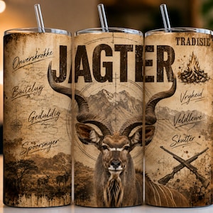 May include: A cylindrical tumbler with a clear straw featuring a graphic of a kudu, mountains, and rifles. The text includes "JAGTER," "TRADISIE," "Onverskrokke," "Buitelug," "Geduldig," "Spoorsnyer," "Vryheid," "Veldlewe," and "Skutter" in a sepia tone.