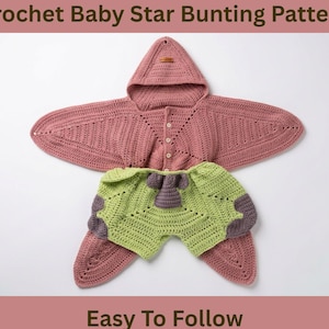 May include: A crochet baby star bunting pattern featuring a dusty rose hooded star-shaped garment with a button-down front and a light green and purple crocheted overlay piece. The text Crochet Baby Star Bunting Pattern and Easy To Follow is visible.