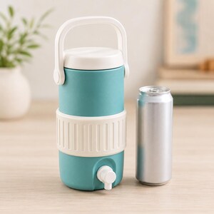 May include: A teal and white water cooler with a white handle and a spigot. The cooler is cylindrical and has a white band around the middle. A silver can is next to the cooler.