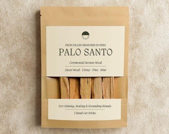 May include: A package of Palo Santo ceremonial incense wood from Peru. The package is tan with a white label that reads "PALO SANTO" and "Ceremonial Incense Wood". The package contains 5 hand-cut sticks. The text "For Calming, Healing & Grounding Rituals" is also visible.