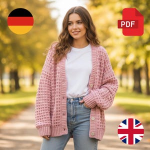 May include: A light pink, chunky knit cardigan with a waffle stitch pattern. The cardigan has large, round buttons and is worn over a white t-shirt and blue jeans. The image includes a PDF icon.